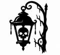 Ornate hanging lantern with skull inside beside a twisted dripping tree